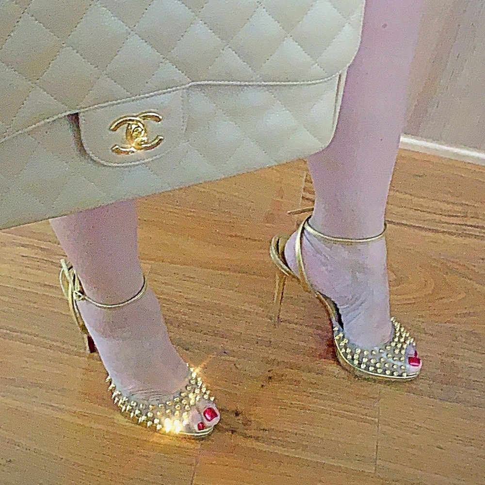 Christian Louboutin's clear gold pike heels